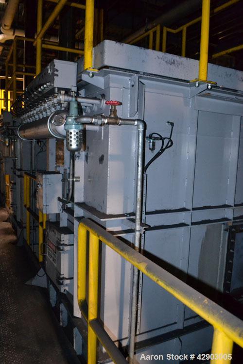 Used Nippon Pneumatic Pulse Jet Dust Collector, Model PBF-50, 538 Square Filter Area. Carbon steel housing 60" wide x 60" long x 66" tall, 12" top plenum, coned bottom. Oval type bags and cages, side...