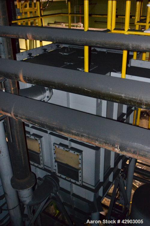 Used Nippon Pneumatic Pulse Jet Dust Collector, Model PBF-50, 538 Square Filter Area. Carbon steel housing 60" wide x 60" long x 66" tall, 12" top plenum, coned bottom. Oval type bags and cages, side...