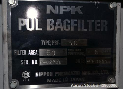 Used Nippon Pneumatic Pulse Jet Dust Collector, Model PBF-50, 538 Square Filter Area. Carbon steel housing 60" wide x 60" long x 66" tall, 12" top plenum, coned bottom. Oval type bags and cages, side...
