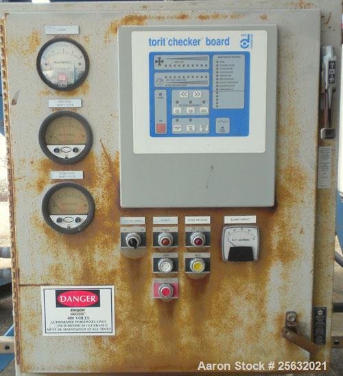 Used Torit Downflo II Cartridge Type Pulse Jet Dust Collector, model DFT3-18, carbon steel. 3420 square feet filter area, nominal airflow range 2,285-14,175 cfm. Includes a checkerboard  control pane...