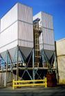 USED: Carbo-Tech 60,000 cfm baghouse type dust collection system,model 39-15-11945, installed new in 1999. Holds (585) 13' long filterbags, not included. Total cloth area 1,945 square feet, air to cl...