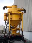 Used Heavy-Duty Trailer Mounted Vacuum Loader for pneumatic removal of virtually any dry materials, sludges and liquids from remote and inaccessible locations through suction lines.  Lines are 8