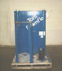 Used Torit Downflo Pulse Jet Cartridge Type Dust Collector, Model 2DF2, Carbon Steel. Approximately 206 square feet filter area, 200-600 cfm. Includes a Totit checkerboard panel. Mounted on legs.