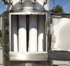 Used-Walker Stainless Equipment Co Model R-HT-06 Round Pulse Jet Dust Collector.  This dust collector has an estimated bag s...