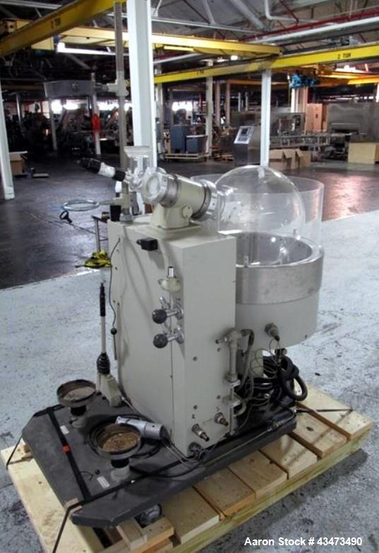 Used Buchi RotaVap, Model R-186EX. With heat bath, main glass flask, 1.6 square meter glass coil condensor, and glass receiver flask on base wth 250 watt heater, 440 volt with controls, serial# 24539...