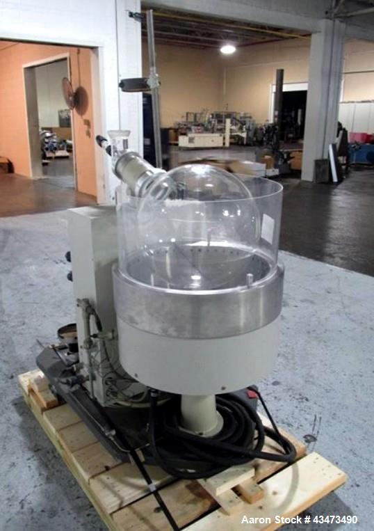 Used Buchi RotaVap, Model R-186EX. With heat bath, main glass flask, 1.6 square meter glass coil condensor, and glass receiver flask on base wth 250 watt heater, 440 volt with controls, serial# 24539...