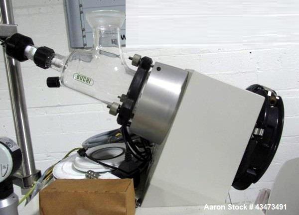 Used Buchi RotaVap, Model R-250EX. With heat bath, main glass flask and glass coil condensor on base wth 9.1 kw heater, 440 volt with controls, type 8621D541, serial# 411666010001, built 2001