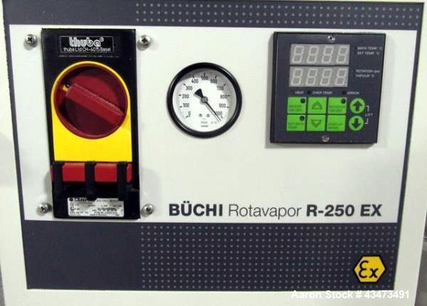 Used Buchi RotaVap, Model R-250EX. With heat bath, main glass flask and glass coil condensor on base wth 9.1 kw heater, 440 volt with controls, type 8621D541, serial# 411666010001, built 2001