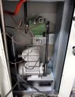 Used Buchi RotaVap, Model R-186EX. With heat bath, main glass flask, 1.6 square meter glass coil condensor, and glass receiver flask on base wth 250 watt heater, 440 volt with controls, serial# 24539...