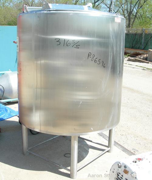 Used APV Single Effect Paravap Rising Film Evaporator, Model R86, 316 Stainless Steel. Approximate feed rate 10,000 pounds/hour, product rate 9412 pounds/hour, evaporation rate 588 pounds/hour. Syste...