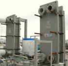 USED: APV single effect Paravap rising film evaporator, model R86, 316 stainless steel. Approximate feed rate 10,000 pounds/hour, product rate 9412 pounds/hour, evaporation rate 588 pounds/hour. Syst...