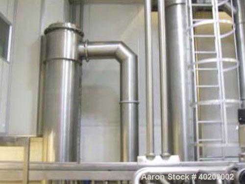 Unused-Used: Scheffers 2 Stage Falling Film Milk Evaporator with Thermal Recompression; Evaporation rate of 3,700kg/hr; Steam requirement 1,300kg/hr @ 800 kPa; Feed rate 5,300kg/hr; Concentrate 1,500...