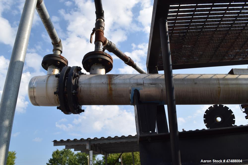 Used C.E. Howard Distillation System Consisting Of: (1) Approximate 18" diameter x 214" tall stainless steel column. (1) Approximate 250 gallon jacketed tank. Internal rated Vacuum/15 psi at 353 degr...