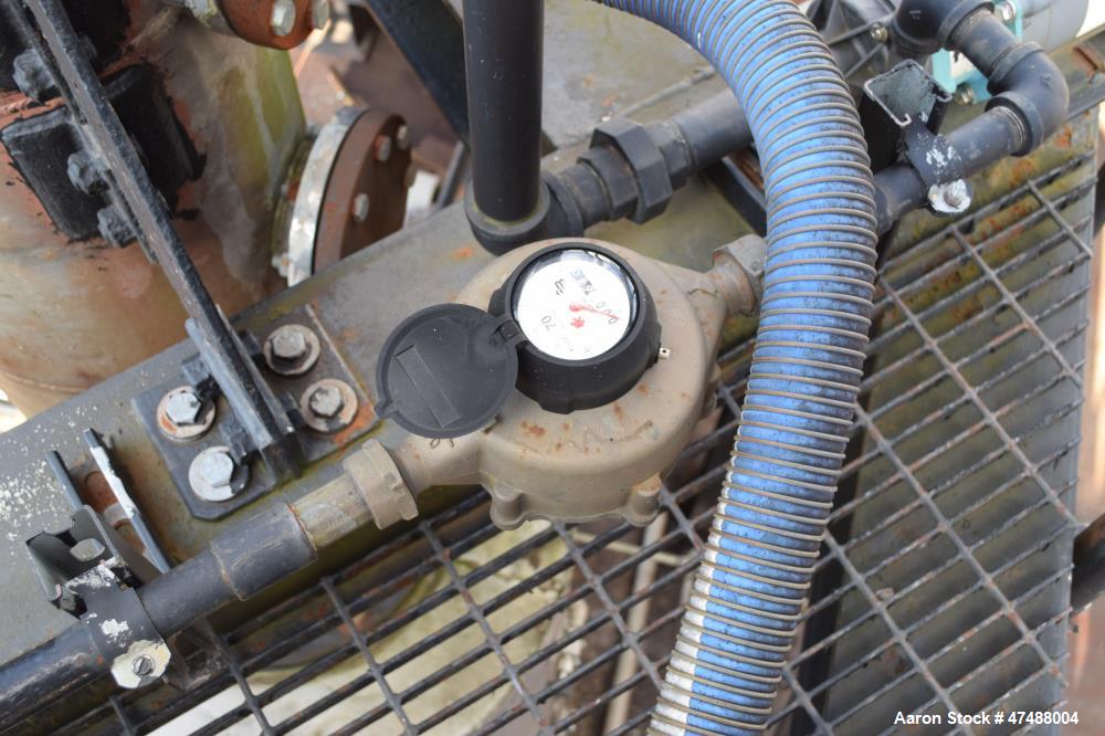 Used C.E. Howard Distillation System Consisting Of: (1) Approximate 18" diameter x 214" tall stainless steel column. (1) Approximate 250 gallon jacketed tank. Internal rated Vacuum/15 psi at 353 degr...