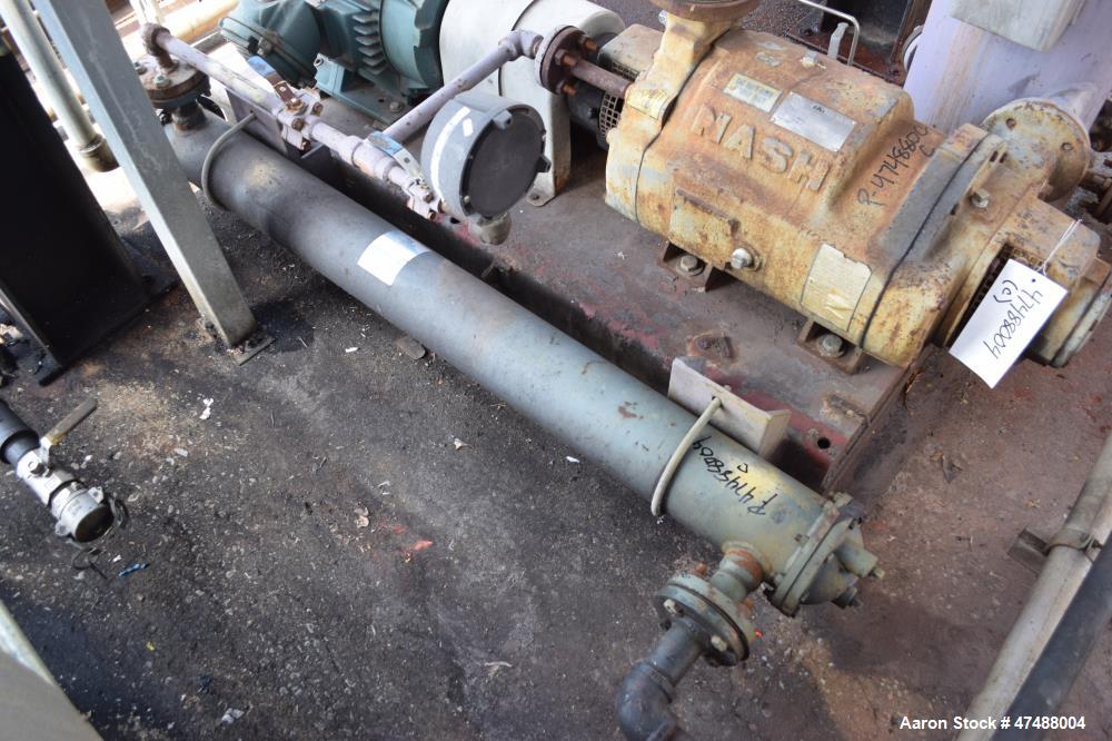 Used C.E. Howard Distillation System Consisting Of: (1) Approximate 18" diameter x 214" tall stainless steel column. (1) Approximate 250 gallon jacketed tank. Internal rated Vacuum/15 psi at 353 degr...