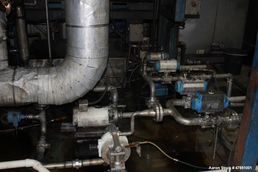 Used Encon Evaporator - Model MVC 900. 900 gallons per hour. Fully automated with PLC controls. Approximately 600 gallon separation vessel with vane, mesh, and fabric mist. Chemflo centrifugal pump. ...