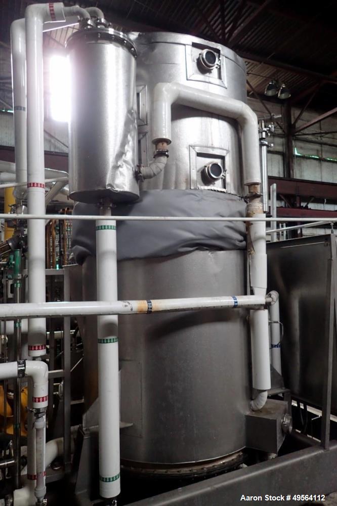 Used MECO Vapor Compression Still, Model PES1000MSSH. Nominally rated 1000 gph. 75 hp blower. Skid mounted. Serial# 7702, built 2001.
