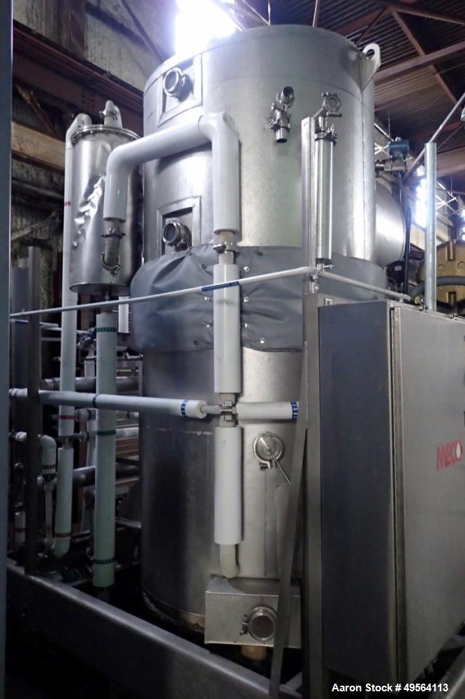 Used MECO Vapor Compression Still, Model PES1000MSSH. Nominally rated 1000 gph. 75 hp blower. Skid mounted. Serial# 7701, built 2001.