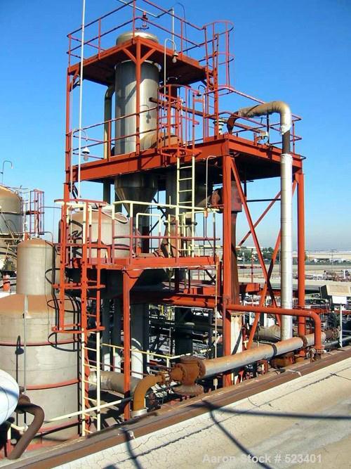 USED: Rossi Catelli double effect evaporator, model T60, rated 48,400 lbs/hour water evaporation, feed rate of 60,000 lbs/hour, finished product rate of 12,000 lbs/hour, 316 stainless steel. Used to ...