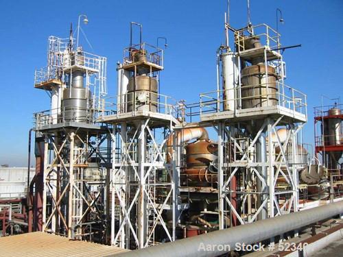 USED: Rossi Catelli double effect evaporator, model T60, rated 48,400 lbs/hour water evaporation, feed rate of 60,000 lbs/hour, finished product rate of 12,000 lbs/hour, 316 stainless steel. Used to ...