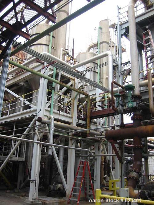 USED: Rossi Catelli double effect evaporator, model T60, rated 48,400 lbs/hour water evaporation, feed rate of 60,000 lbs/hour, finished product rate of 12,000 lbs/hour, 316 stainless steel. Used to ...