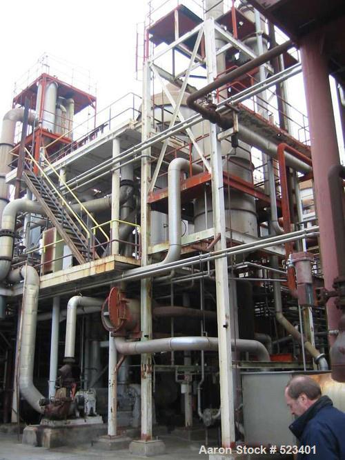 USED: Rossi Catelli double effect evaporator, model T60, rated 48,400 lbs/hour water evaporation, feed rate of 60,000 lbs/hour, finished product rate of 12,000 lbs/hour, 316 stainless steel. Used to ...