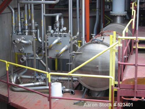 USED: Rossi Catelli double effect evaporator, model T60, rated 48,400 lbs/hour water evaporation, feed rate of 60,000 lbs/hour, finished product rate of 12,000 lbs/hour, 316 stainless steel. Used to ...