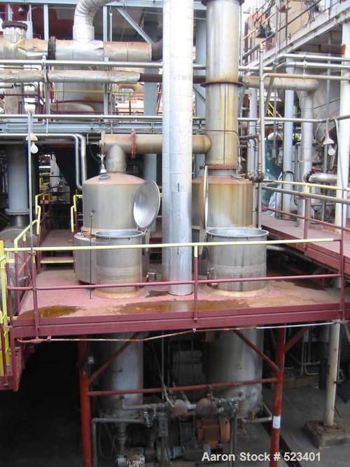 USED: Rossi Catelli double effect evaporator, model T60, rated 48,400 lbs/hour water evaporation, feed rate of 60,000 lbs/hour, finished product rate of 12,000 lbs/hour, 316 stainless steel. Used to ...