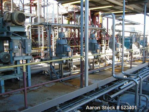 USED: Rossi Catelli double effect evaporator, model T60, rated 48,400 lbs/hour water evaporation, feed rate of 60,000 lbs/hour, finished product rate of 12,000 lbs/hour, 316 stainless steel. Used to ...