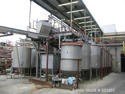 USED: Rossi Catelli double effect evaporator, model T60, rated 48,400 lbs/hour water evaporation, feed rate of 60,000 lbs/hour, finished product rate of 12,000 lbs/hour, 316 stainless steel. Used to ...