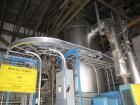 Used GEA / Niro Falling Film Mechanical Vapor Recompression (MVR) Evaporator. Single effect, approximately 1,500 square feet. Evaporative capacity: 3,688 lb/hour water. Materials of construction: pri...