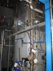 Used GEA / Niro Falling Film Mechanical Vapor Recompression (MVR) Evaporator. Single effect, approximately 1,500 square feet. Evaporative capacity: 3,688 lb/hour water. Materials of construction: pri...