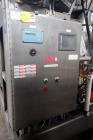 Used MECO Vapor Compression Still, Model PES1000MSSH. Nominally rated 1000 gph. 75 hp blower. Skid mounted. Serial# 7702, built 2001.