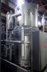 Used MECO Vapor Compression Still, Model PES1000MSSH. Nominally rated 1000 gph. 75 hp blower. Skid mounted. Serial# 7701, built 2001.
