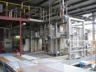 USED: Rossi Catelli double effect evaporator, model T60, rated 48,400 lbs/hour water evaporation, feed rate of 60,000 lbs/hour, finished product rate of 12,000 lbs/hour, 316 stainless steel. Used to ...
