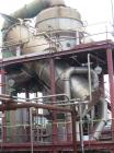 USED: Rossi Catelli double effect evaporator, model T60, rated 48,400 lbs/hour water evaporation, feed rate of 60,000 lbs/hour, finished product rate of 12,000 lbs/hour, 316 stainless steel. Used to ...