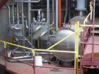 USED: Rossi Catelli double effect evaporator, model T60, rated 48,400 lbs/hour water evaporation, feed rate of 60,000 lbs/hour, finished product rate of 12,000 lbs/hour, 316 stainless steel. Used to ...
