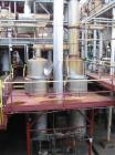 USED: Rossi Catelli double effect evaporator, model T60, rated 48,400 lbs/hour water evaporation, feed rate of 60,000 lbs/hour, finished product rate of 12,000 lbs/hour, 316 stainless steel. Used to ...