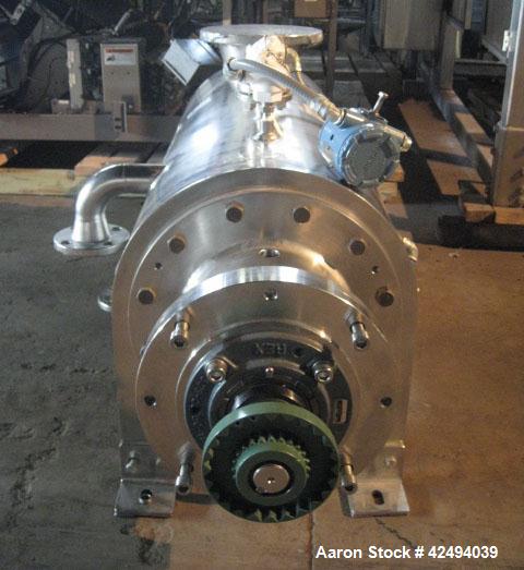 Used Artisan Rotoherm evaporation system, consisting of (1) 5 sq ft surface area Artisan Rototherm counter-curent evaporator, 316L stainless steel construction, approximately 18" diameter x 48" long ...