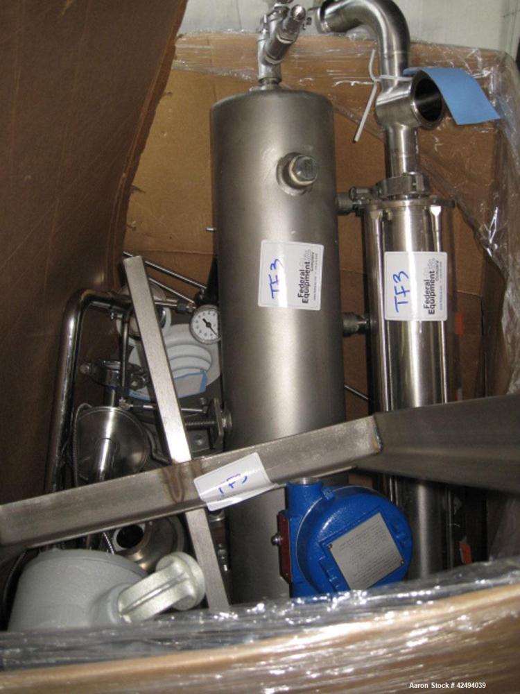 Used Artisan Rotoherm evaporation system, consisting of (1) 5 sq ft surface area Artisan Rototherm counter-curent evaporator, 316L stainless steel construction, approximately 18" diameter x 48" long ...