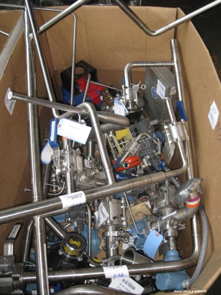 Used Artisan Rotoherm evaporation system, consisting of (1) 5 sq ft surface area Artisan Rototherm counter-curent evaporator, 316L stainless steel construction, approximately 18" diameter x 48" long ...