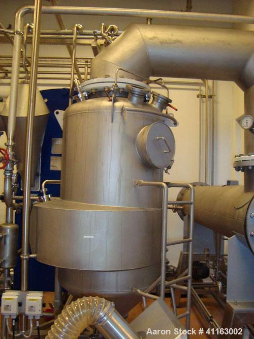 Used APV 2 Stage Evaporator, Capacity Approximately 4400 lbs/hr (2000 Kg/hr) finished product consisting of: (2) APV evaporators 29.25” diameter x 46.8” straight side (750 mm diameter x 1200 mm strai...