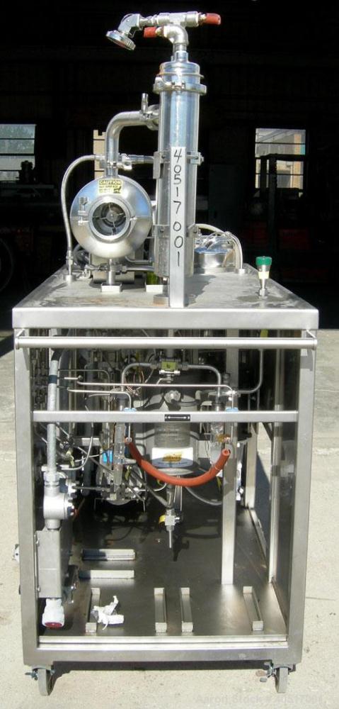 Used Artisan Single Cylinder Thin Film Evaporator, Model Protherm 50.  .5 square feet, horizontal, 316 stainless steel contact areas. 3-7/8" diameter x 13-1/2" long jacketed chamber. Internal rated F...