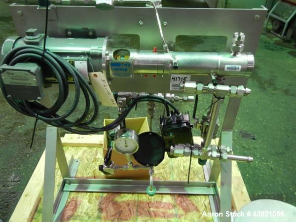 Used LCI LABVAP Horizontal Thin Film Evaporator, 0.25 Square Feet. 316 Stainless steel construction. Internal rated Full Vacuum at 650 degrees F. 1/8" Product inlet, 1" product outlet, 1" vapor outle...