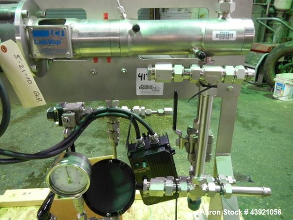 Used LCI LABVAP Horizontal Thin Film Evaporator, 0.25 Square Feet. 316 Stainless steel construction. Internal rated Full Vacuum at 650 degrees F. 1/8" Product inlet, 1" product outlet, 1" vapor outle...