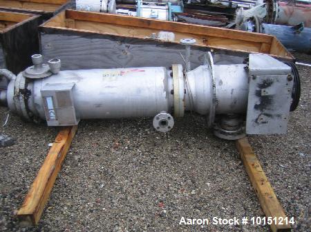 Used LCI Vertical Turbofan Thin Film Evaporator. 11.8 square feet, 316 stainless steel construction. 12" diameter x 48" long. Unit is rated for 130 PSI/FV at 650 Degree F. No Drive.