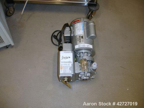 Used Pope Scientific Wiped Film Evaporator, .35 Square Feet. 2" Diameter, glass chamber, stainless steel rotor with Teflon wipers, electrically heated with heater band, glass coil condenser, receiver...