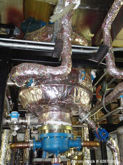 Used Pfaudler Wipe Film Evaporator. Approximately 25 square feet, 316 stainless steel, internal rated 25 psi/full vacuum @ 650 deg F, jacket rated 150 psi @ 650 deg F, 4 gpm, rated capacity 2 mm gall...