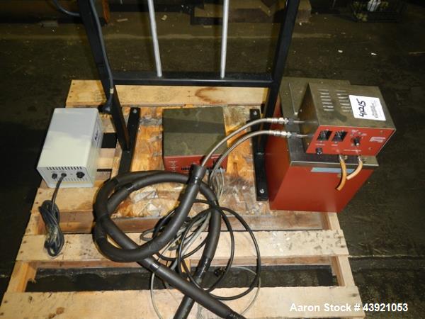 Used Pope Scientific Wiped Film Evaporator, 0.35 Square Feet. 2" Diameter glass chamber, stainless steel rotor with Teflon wipers driven by 1/12 hp dc motor with controller, glass coil condenser with...