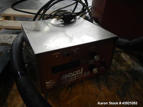 Used Pope Scientific Wiped Film Evaporator, 0.35 Square Feet. 2" Diameter glass chamber, stainless steel rotor with Teflon wipers driven by 1/12 hp dc motor with controller, glass coil condenser with...